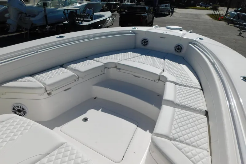 Slide: The Image of Luxurious seating area on 2026 Regulator 30XO boat with quilted cushions. - 20