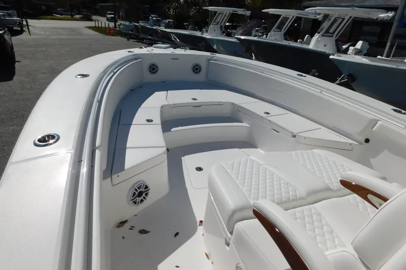 Slide: The Image of 2026 Regulator 30XO boat interior with white seating and modern design. - 21