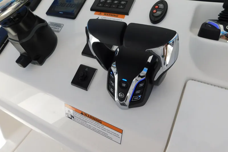Slide: The Image of Control panel of 2026 Regulator 30XO boat with advanced throttle system. - 28