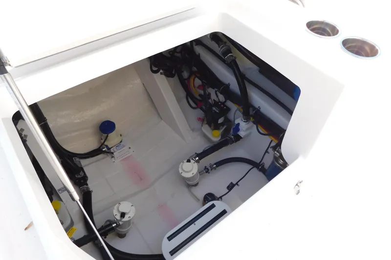 Slide: The Image of 2026 Regulator 30XO boat compartment showcasing internal wiring and components. - 32