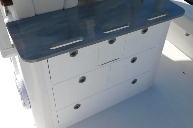 Slide: The Image of 2026 Regulator 30XO boat storage drawers with sleek countertop design. - 37