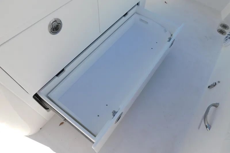 Slide: The Image of Open storage compartment on 2026 Regulator 30XO boat, showcasing sleek design and functionality. - 40