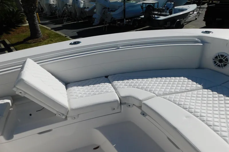 Slide: The Image of Luxurious seating on 2026 Regulator 30XO boat with quilted white upholstery. - 44