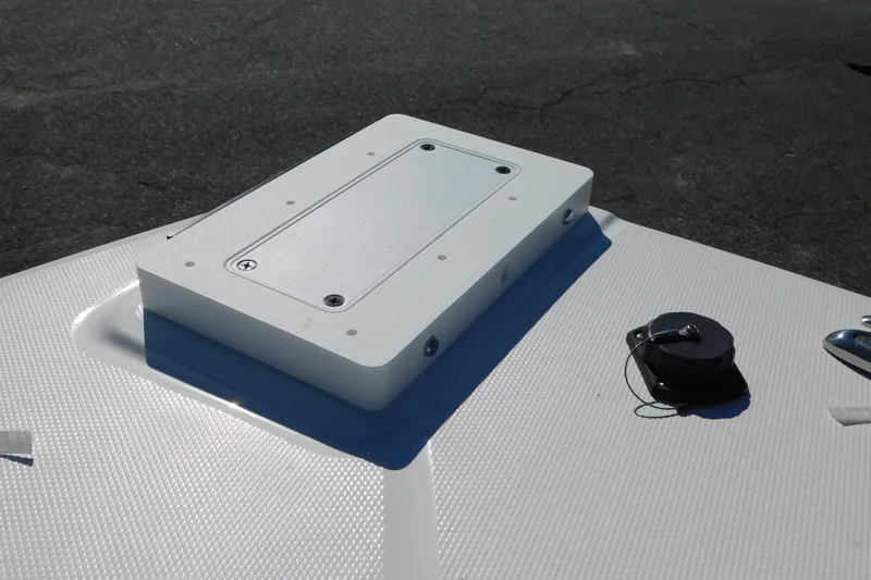 Slide: The Image of 2026 Regulator 30XO boat deck with mounted equipment and textured surface. - 45