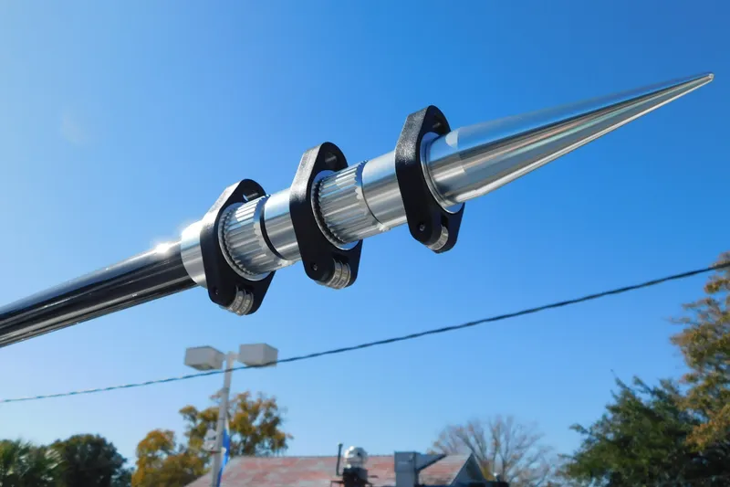 Slide: The Image of Sleek metal antenna on 2026 Regulator 30XO boat against clear blue sky. - 53