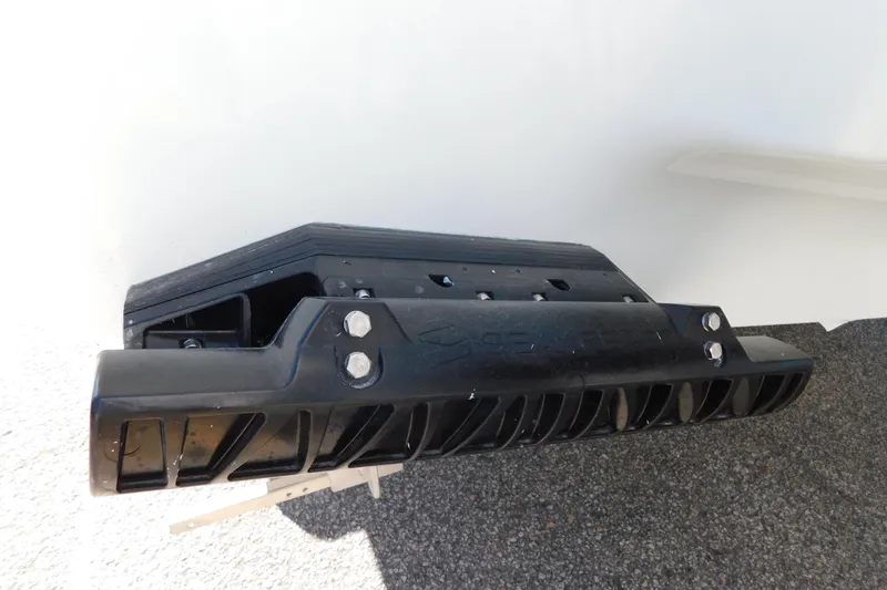 Slide: The Image of 2026 Regulator 30XO boat component, featuring a black SeaKeeper stabilizer on a textured surface. - 55