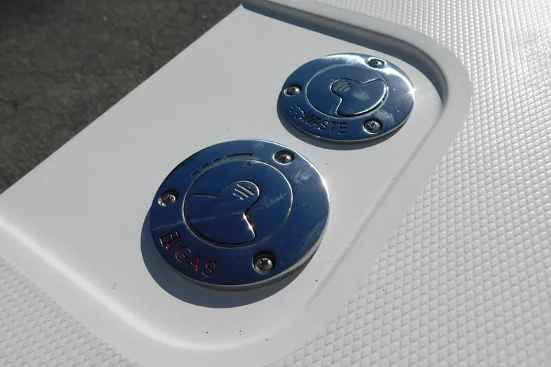 Slide: The Image of Fuel and waste caps on 2026 Regulator 30XO boat deck. - 61