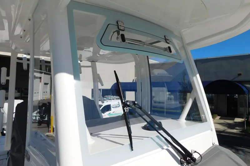 Slide: The Image of 2026 Regulator 30XO boat windshield with wipers, showcasing modern design and functionality. - 62