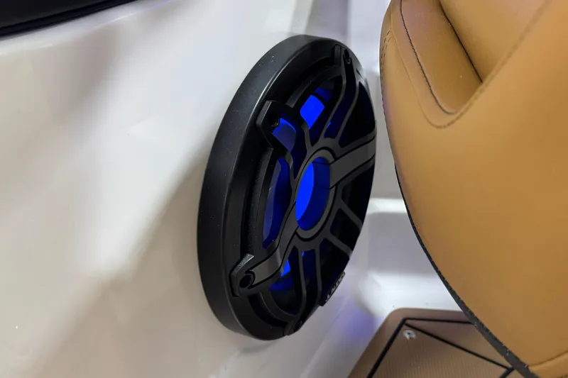 Slide: The Image of Speaker with blue LED lighting in 2026 Chaparral 6 SSX boat interior. - 18