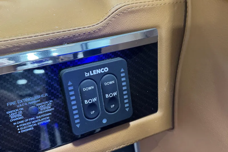 Slide: The Image of Control panel on 2026 Chaparral 6 SSX boat with Lenco trim tab switches. - 24