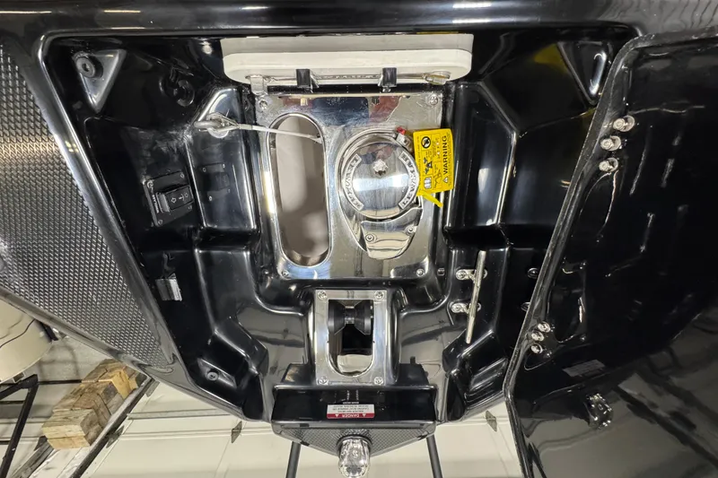 Slide: The Image of Underside view of 2026 Chaparral 6 SSX boat, showcasing mechanical components. - 37