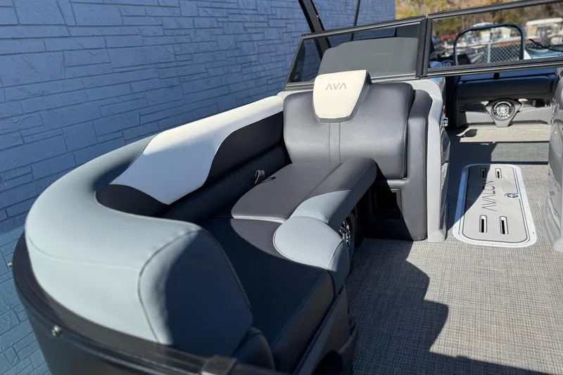 Slide: The Image of 2026 Avalon 2385 LSZ VRB Windshield boat interior with plush seating and modern design. - 14