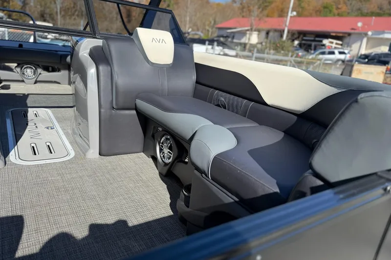 Slide: The Image of 2026 Avalon 2385 LSZ VRB Windshield boat interior with plush seating and modern design. - 15