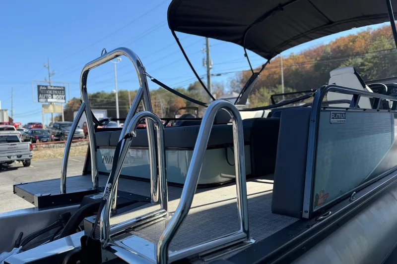 Slide: The Image of 2026 Avalon 2385 LSZ VRB Windshield boat with sleek design and chrome details. - 6