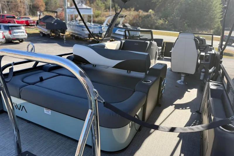Slide: The Image of 2026 Avalon 2385 LSZ VRB Windshield boat interior with seating and steering console. - 7