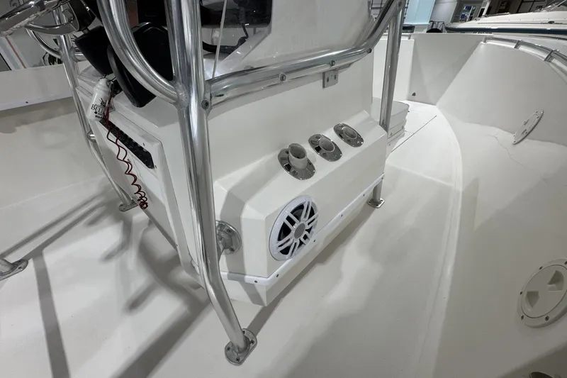 Slide: The Image of 2009 Contender 21 Open boat interior with steering console and speaker system. - 10