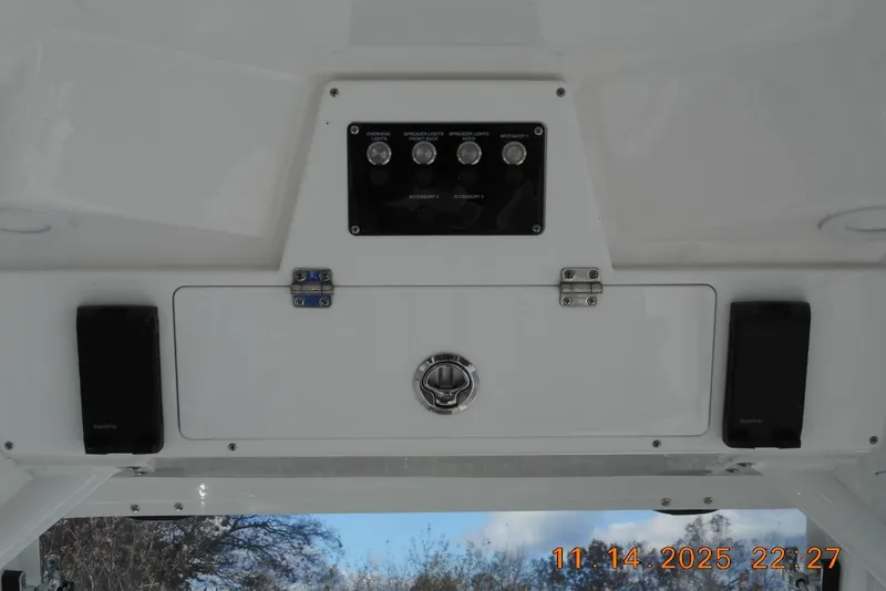 Slide: The Image of 2026 Sea Fox 288 Commander dashboard with control panel and speakers. - 28