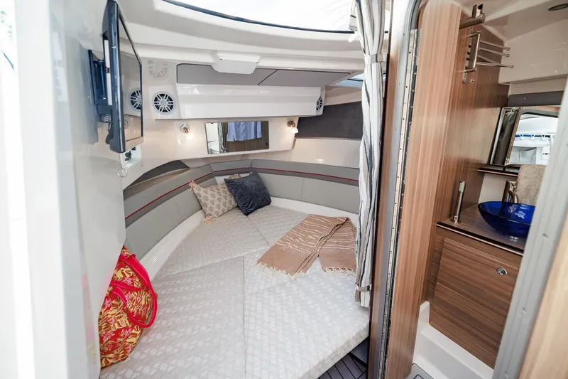 Slide: The Image of Manufacturer Provided Image: Luxurious interior of 2026 Solara S-310 SB boat with cozy cabin and modern amenities. - 6
