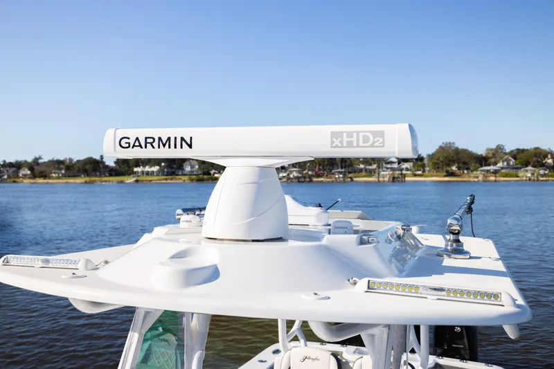 Slide: The Image of 2023 Yellowfin 36 Offshore boat with Garmin xHD2 radar on calm water. - 52