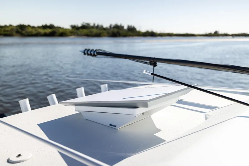 Slide: The Image of 2023 Yellowfin 36 Offshore boat with Seaview radar on calm water. - 54