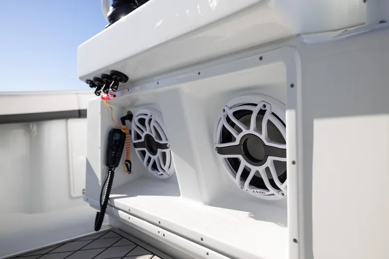 Slide: The Image of 2023 Yellowfin 36 Offshore boat speakers and radio system detail. - 58