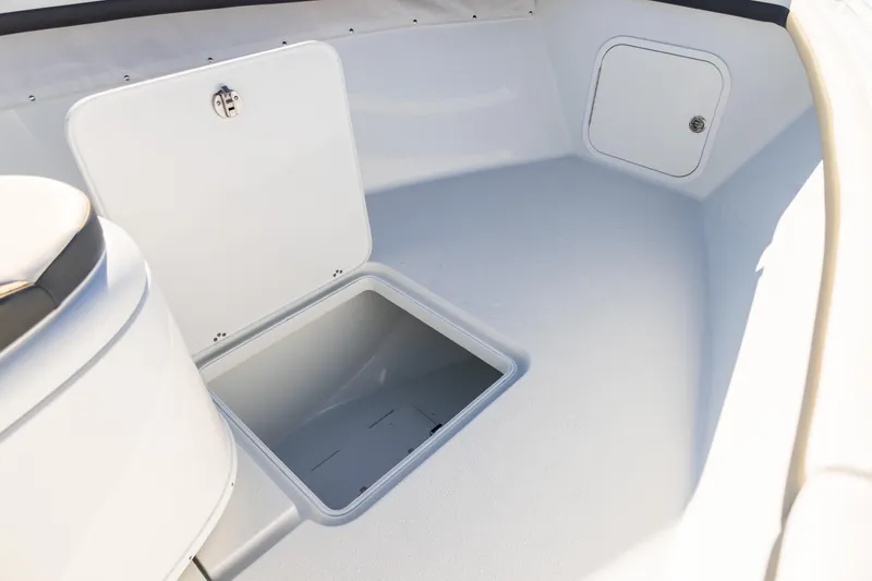 Slide: The Image of 2023 Yellowfin 36 Offshore boat storage compartment with open hatch. - 60