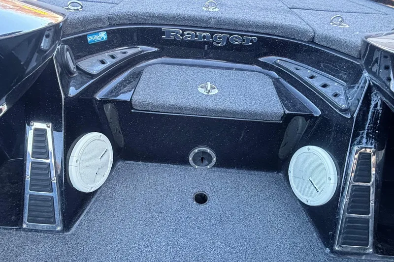 Slide: The Image of 2017 Ranger Z521 Comanche boat interior with speakers and storage compartments. - 10