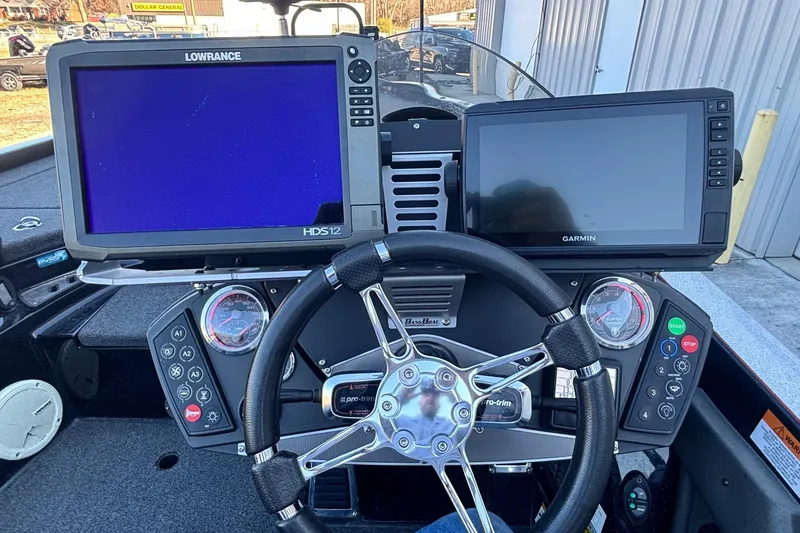 Slide: The Image of 2017 Ranger Z521 Comanche dashboard with Lowrance and Garmin displays, steering wheel, and controls. - 14