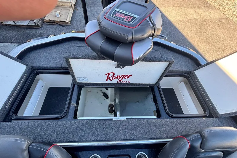 Slide: The Image of 2017 Ranger Z521 Comanche boat interior with storage compartments open. - 17
