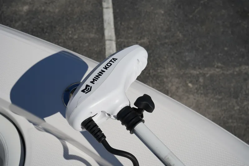 Slide: The Image of Minn Kota motor on 2023 Robalo 266 Cayman boat deck. - 38