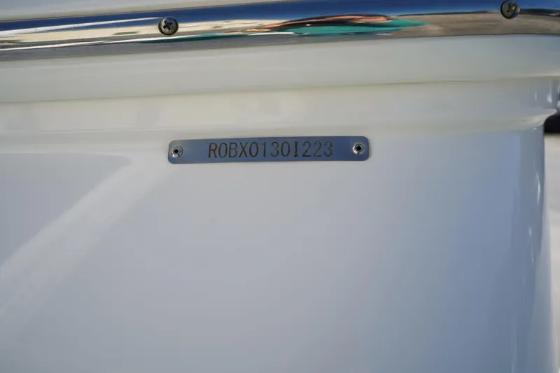 Slide: The Image of 2023 Robalo 266 Cayman boat identification plate with serial number. - 44