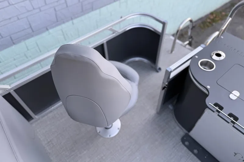 Slide: The Image of 2026 Avalon 2385 Venture 85 Center Fish boat interior with seating and console. - 13