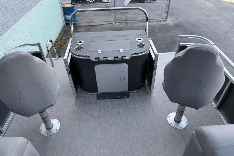 Slide: The Image of 2026 Avalon 2385 Venture 85 Center Fish boat interior with seating and storage compartments. - 15