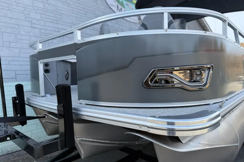 Slide: The Image of 2026 Avalon 2385 Venture 85 Center Fish pontoon boat, sleek design, close-up view. - 4