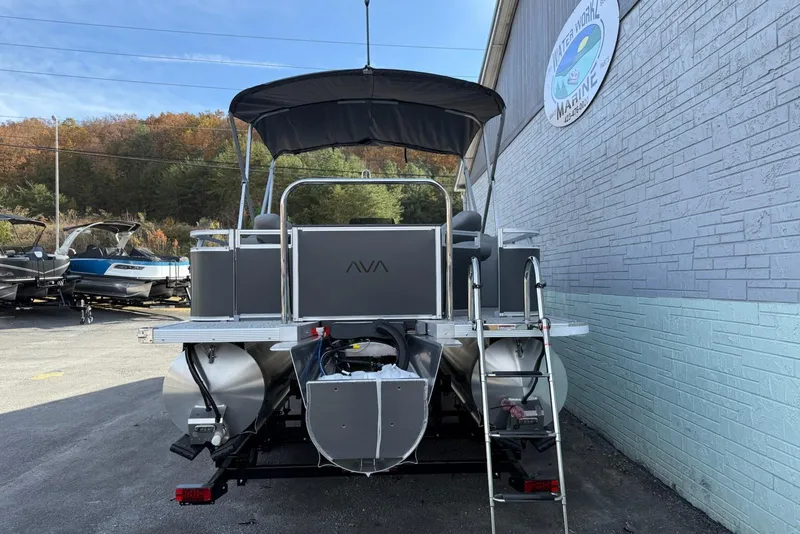 Slide: The Image of 2026 Avalon 2385 Venture 85 Center Fish pontoon boat at marina, rear view. - 6