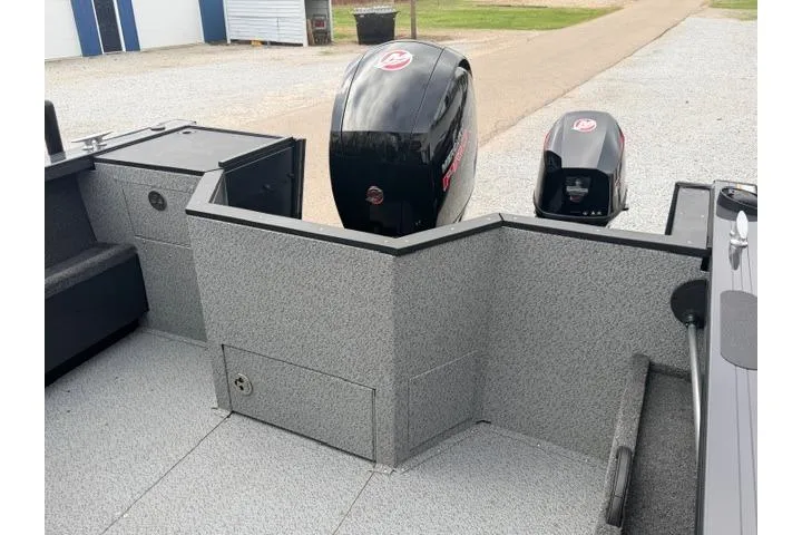 Slide: The Image of 2026 Crestliner 2050 Commander boat with dual outboard motors, featuring a spacious deck. - 10