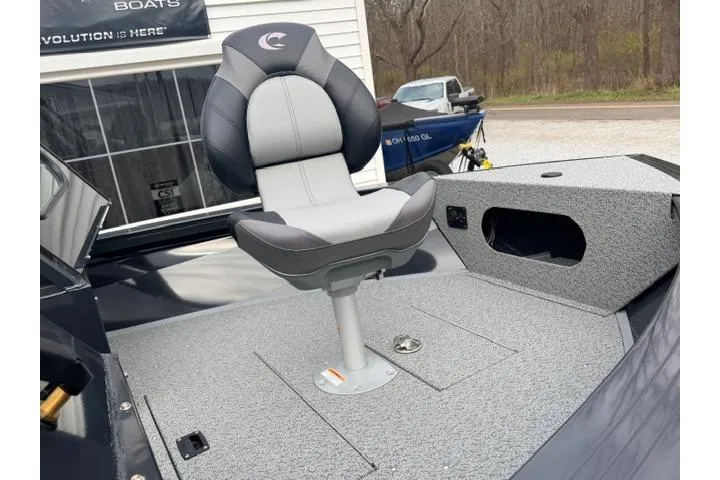 Slide: The Image of 2026 Crestliner 2050 Commander boat interior with a swivel seat and storage compartment. - 7