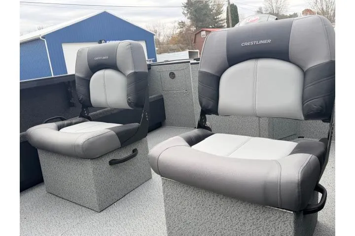 Slide: The Image of 2026 Crestliner 2050 Commander boat seats, gray and black, outdoor setting. - 9