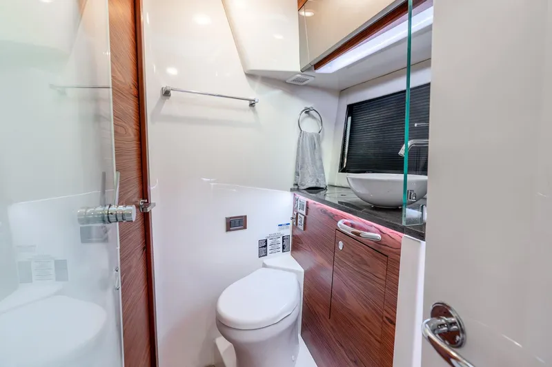 Slide: The Image of Luxurious bathroom interior of 2024 Boston Whaler 405 Conquest yacht, featuring modern fixtures. - 33