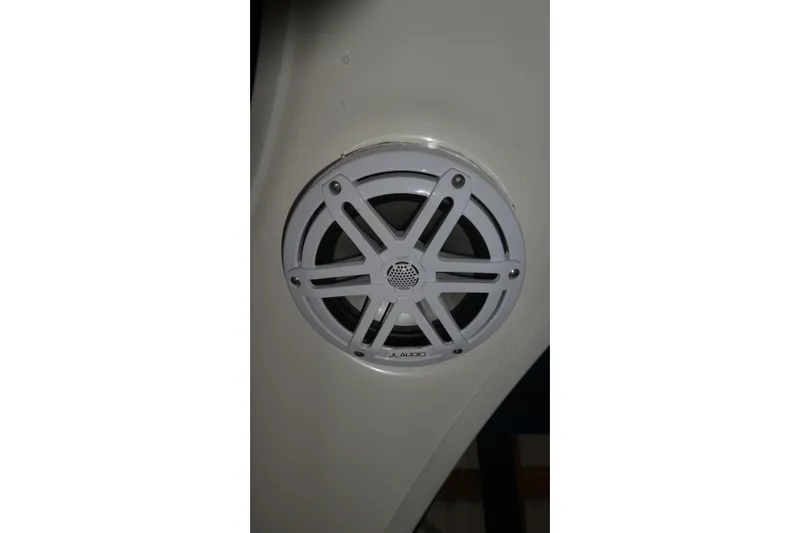 Slide: The Image of White JL Audio speaker on 2007 Bayliner 325 boat interior. - 33
