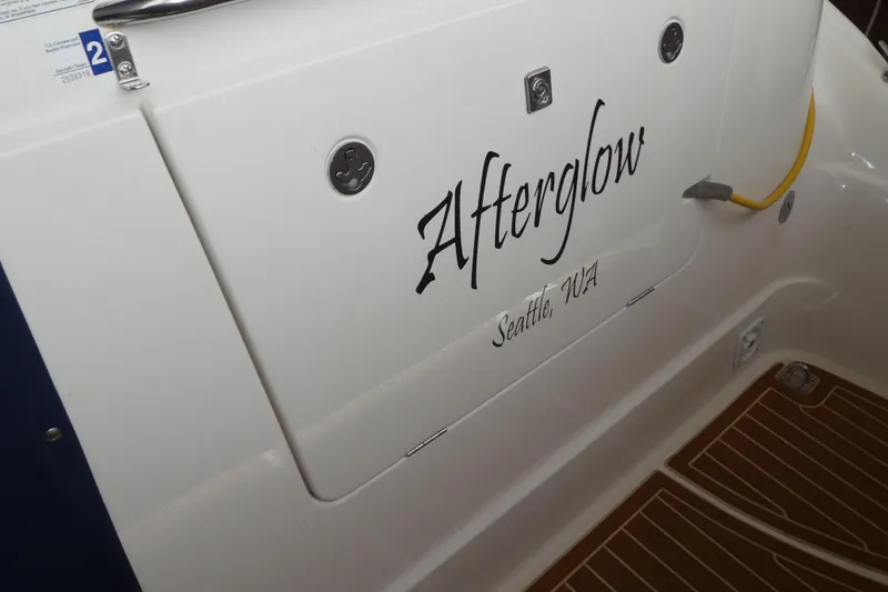 Slide: The Image of Bayliner 325 boat, named "Afterglow," docked in Seattle, WA, 2007 model. - 5