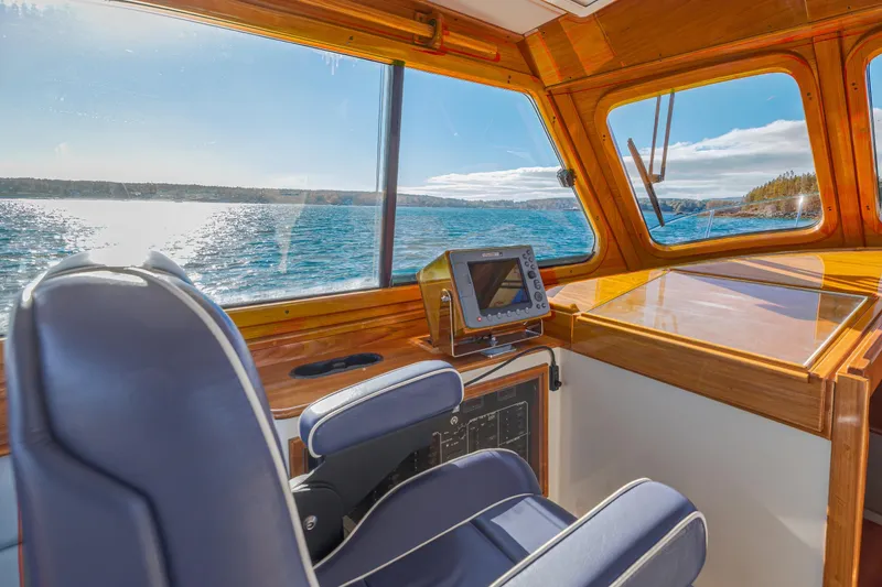 Slide: The Image of Interior view of 1999 Hinckley Talaria 44 Express yacht with ocean scenery. - 26