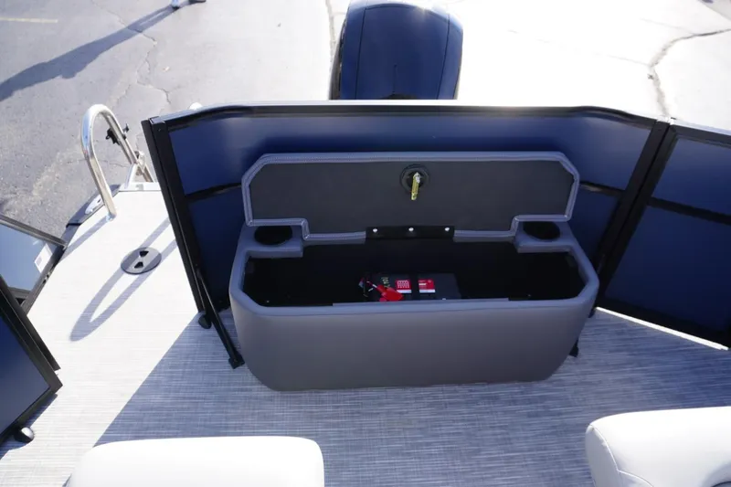 Slide: The Image of 2026 Viaggio Lago V-R boat storage compartment with open lid and visible battery. - 12