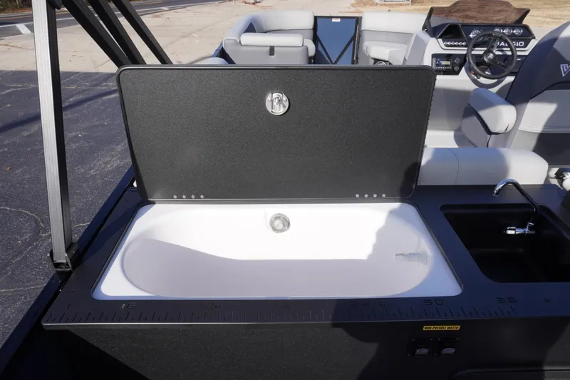 Slide: The Image of 2026 Viaggio Lago V-R boat interior with sink and storage compartment. - 19