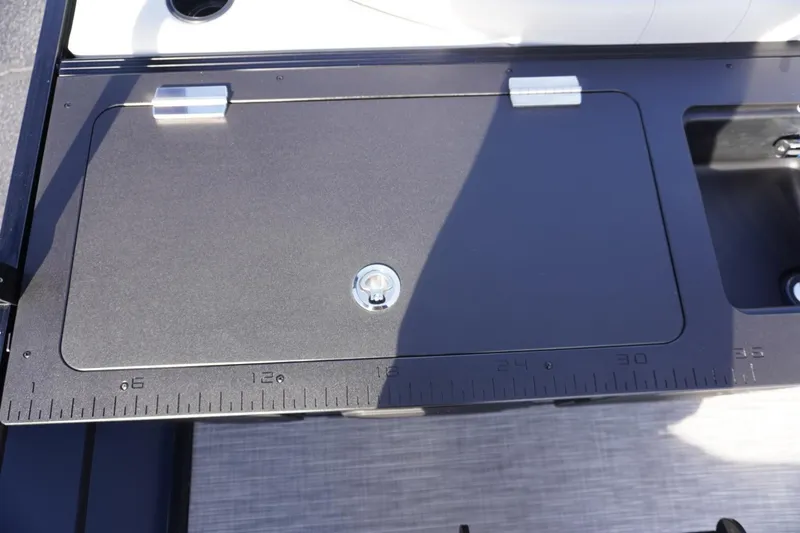 Slide: The Image of Viaggio Lago V-R 2026 boat deck with integrated measuring board and storage compartment. - 22