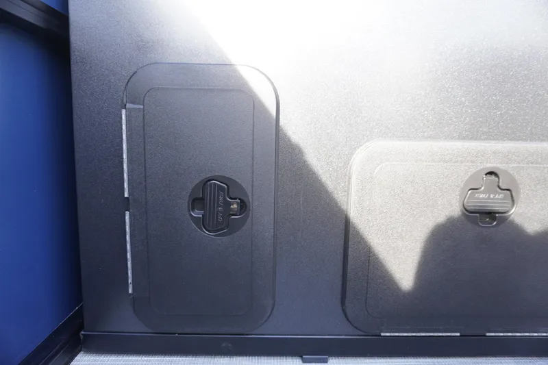 Slide: The Image of 2026 Viaggio Lago V-R storage compartments with secure locking mechanisms. - 26