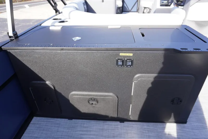 Slide: The Image of 2026 Viaggio Lago V-R boat interior with storage compartments and non-potable water label. - 29