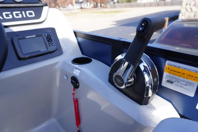 Slide: The Image of 2026 Viaggio Lago V-R boat dashboard with control lever and navigation system. - 36