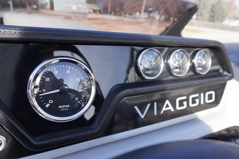Slide: The Image of Dashboard of 2026 Viaggio Lago V-R with RPM and volt gauges. - 42