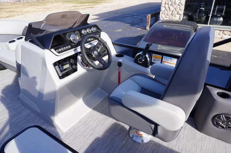 Slide: The Image of Viaggio Lago V-R 2026 boat cockpit with steering wheel and captain's chair. - 43